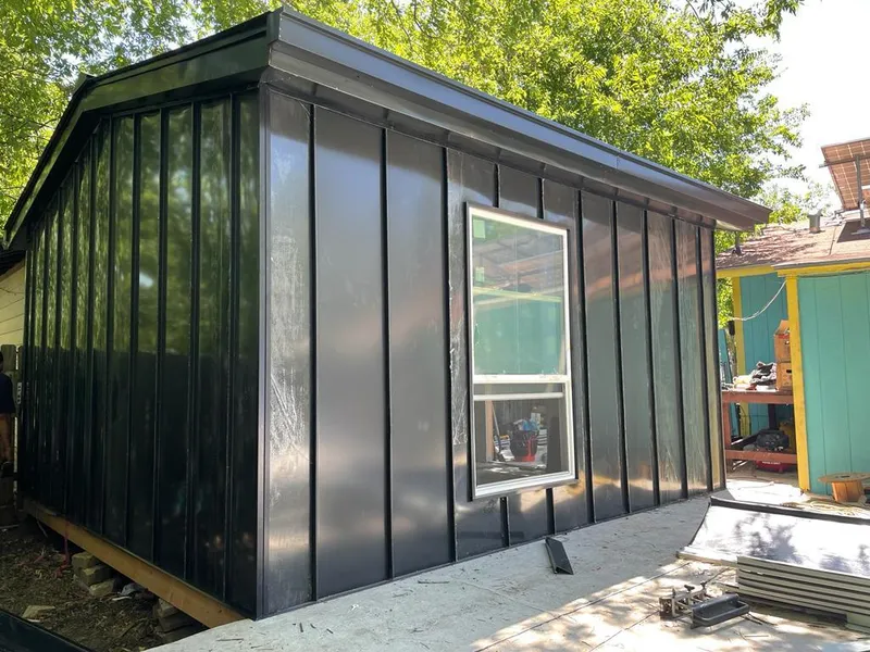 Black standing seam metal wall panels for Roof Inspection in Matthews