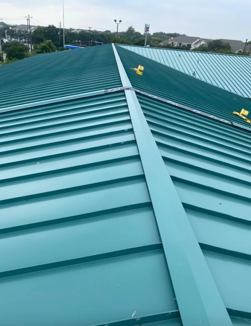 Green commercial metal roof ridge and valley for Metal Roof Repair in Matthews